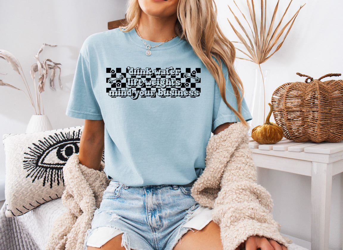 Checkered Drink Water, Lift Weights, Mind Your Business Shirt – Motivational & Comfortable Comfort Colors Tee for Fitness Lovers