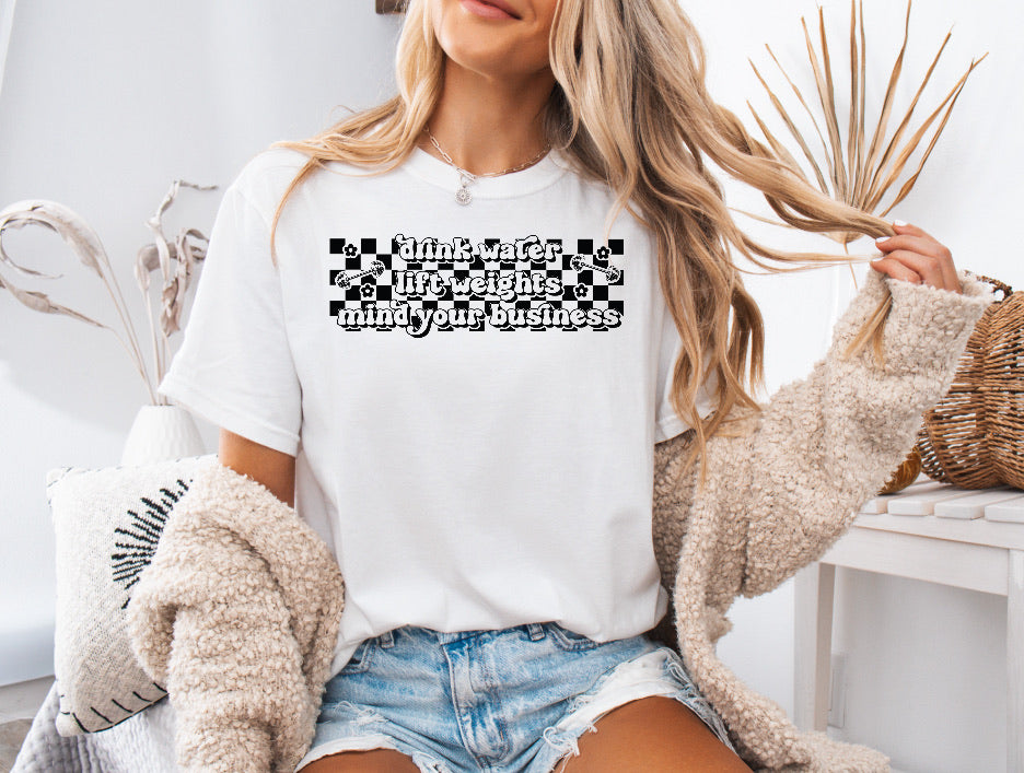 Checkered Drink Water, Lift Weights, Mind Your Business Shirt – Motivational & Comfortable Comfort Colors Tee for Fitness Lovers